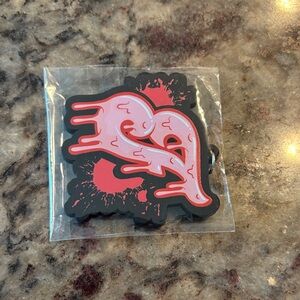 Vibrant Red and Black Bird Toy